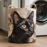 Gewatteerde wasmand – Zwarte kat in close-up