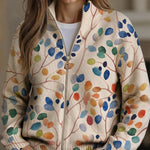 Mieke | Vest met rits en bladerprint